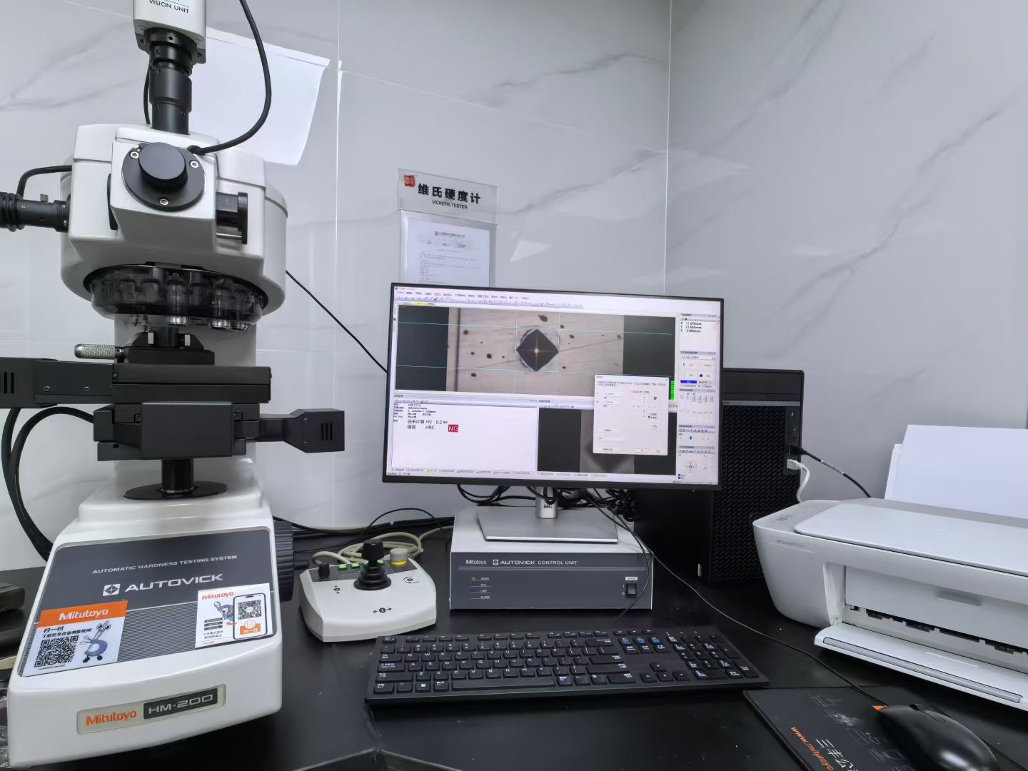 Vickers hardness tester